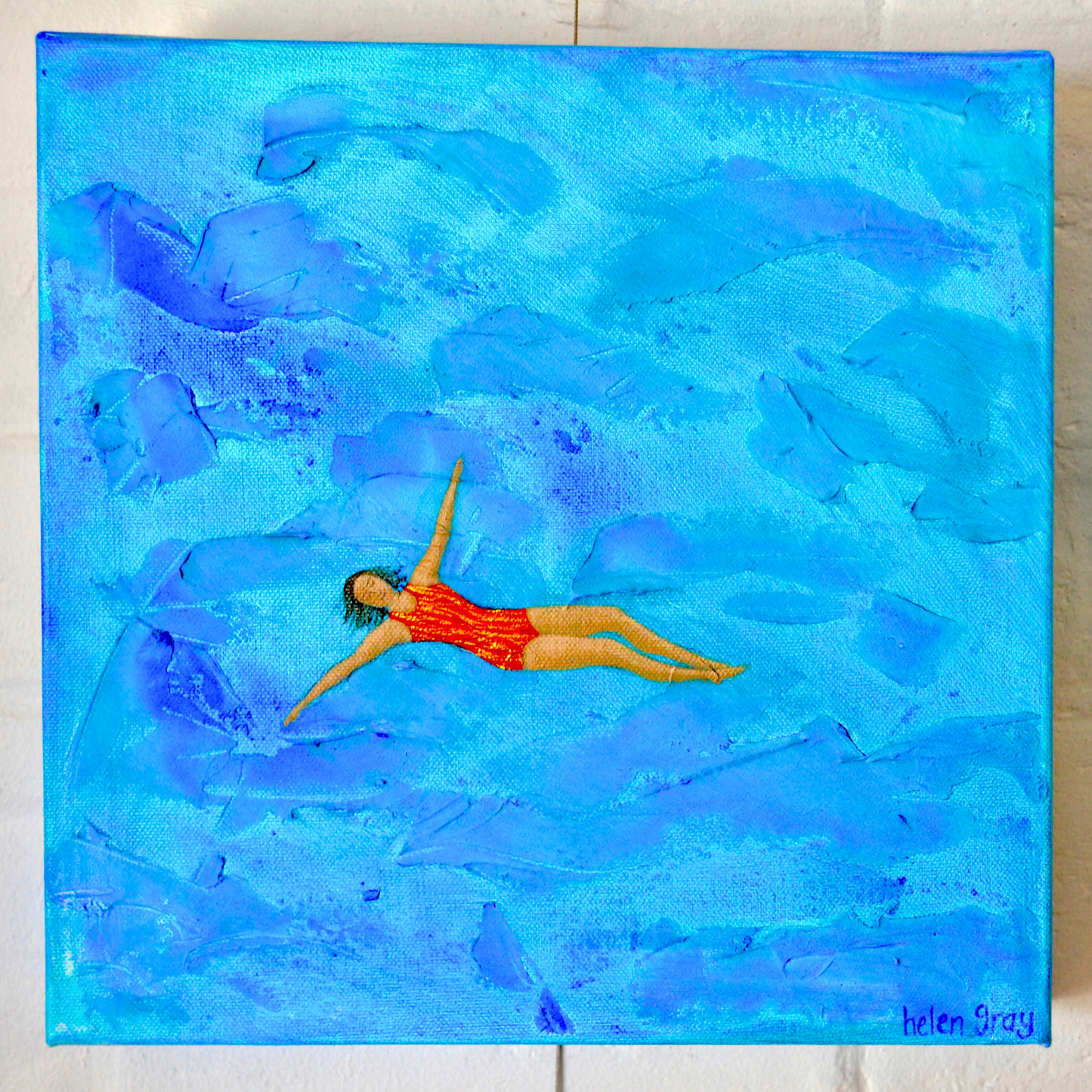 A woman in a red and gold striped swimsuit floating in a turquoise and blue textured sea. Acrylic paint and textured surface on canvas, measuring 30x30cm.